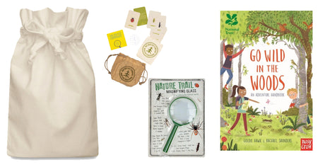 Nature exploration kit with drawstring bag, magnifying glass, and book titled 'Go Wild in the Woods'.
