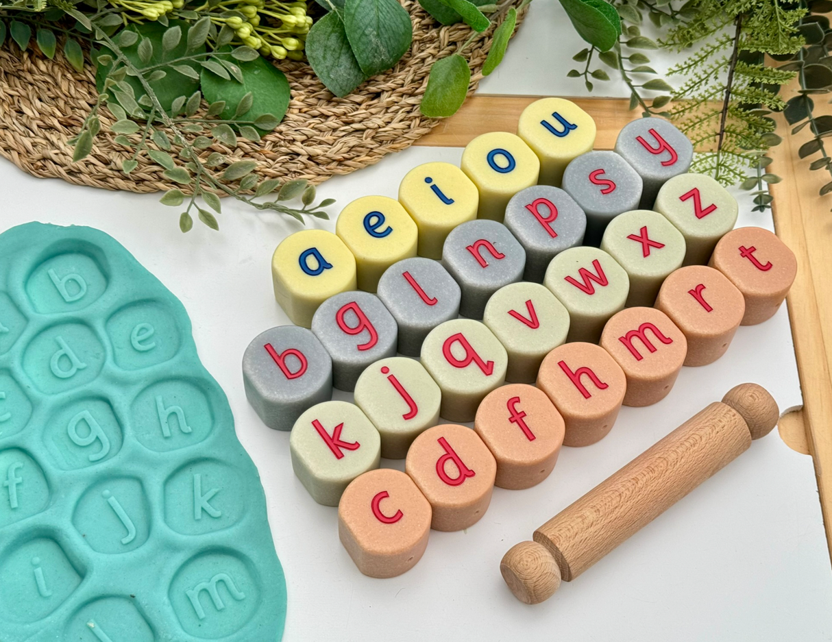 Alphabet stamping stones used with playdough and roller