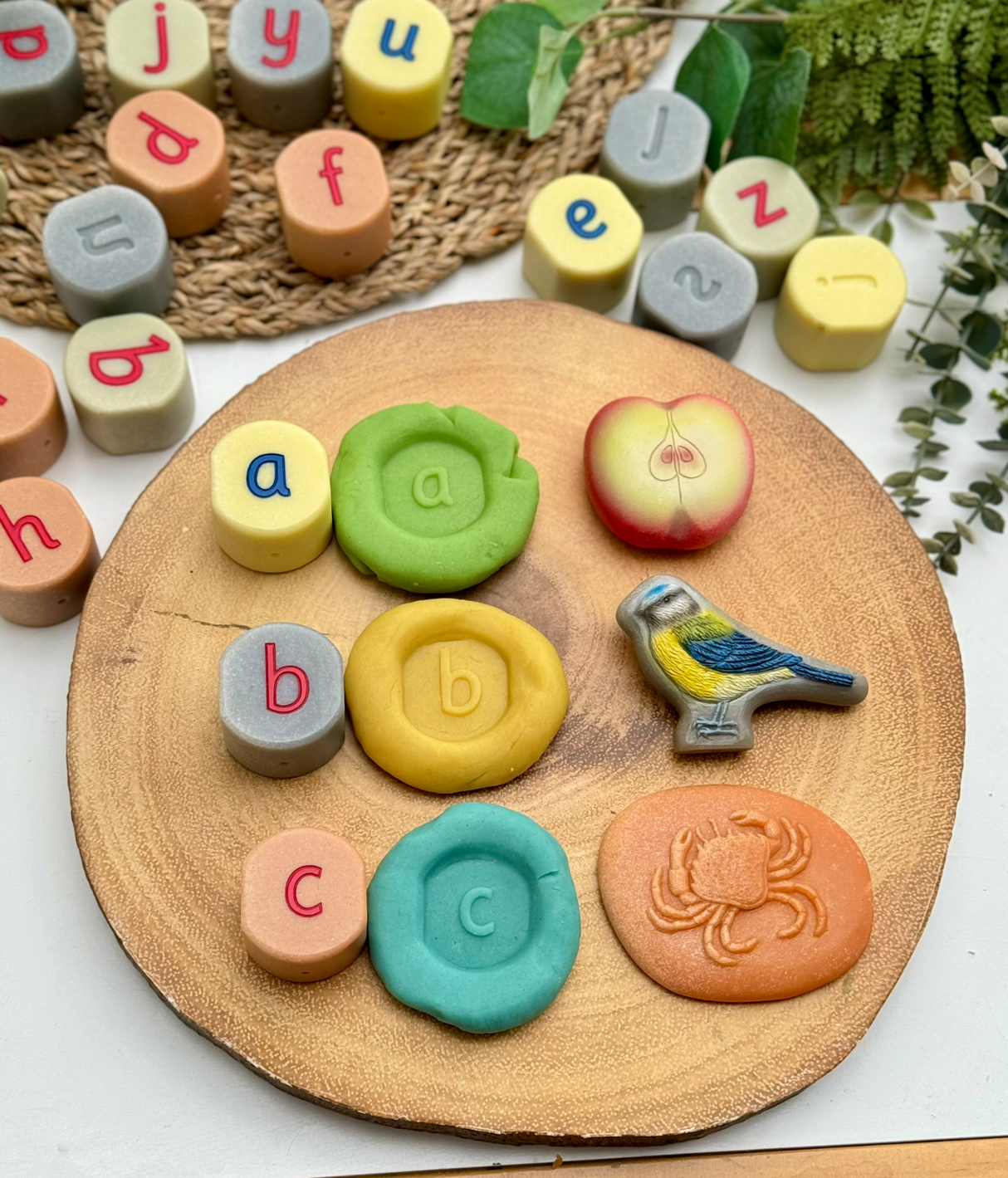 Alphabet stamping stones used with playdough