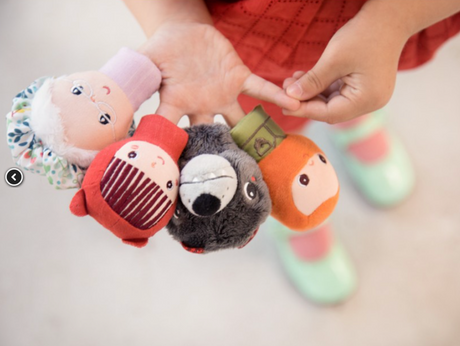 Lilliputiens Red Riding Hood Finger Puppets on a hand