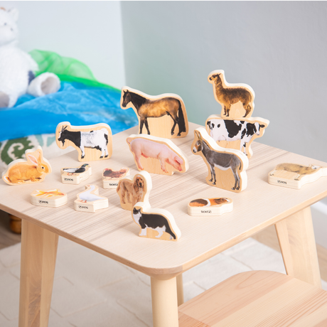 Tickit Wooden Domestic Animal Blocks (15) on a table